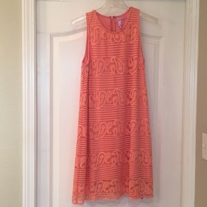 Francesca’s sleeveless peach lace dress